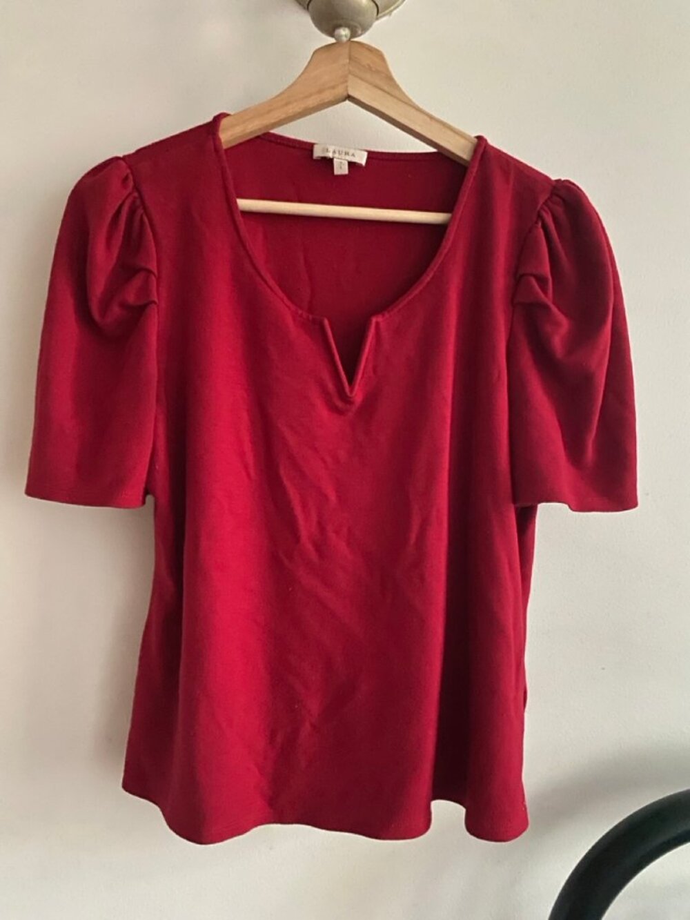 Bright red top with cute neckline and a slight puff sleeve
